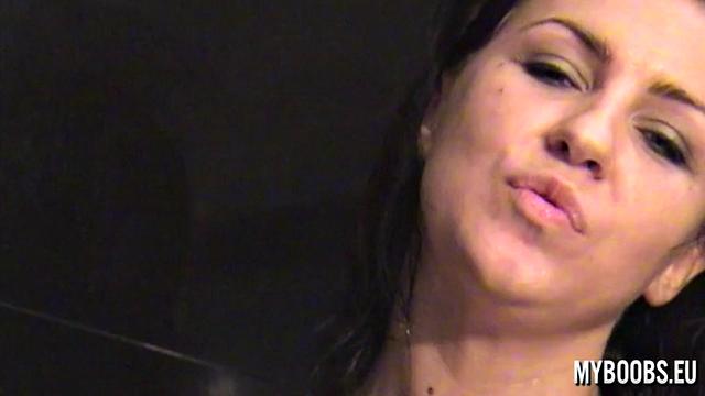 Busty Brunette With Black Dildo