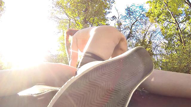 Brunette bombshell with a huge strap-on enjoys outdoor pussy play & wild dildo action