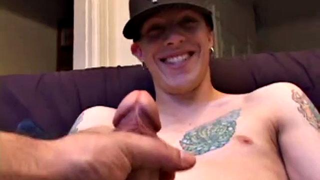 Shane Invites Us to Watch Him Get Naked and Blow His Load. He Plays Himself Through His Shorts and Then Lets His Handy Friend Take Over. Shane Shows Us His Asshole and Eats Some of His Pre-cum, as His Cock Gets a Work Over.