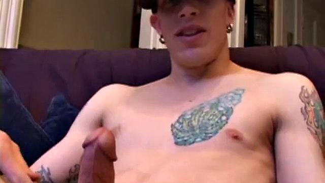 Shane Invites Us to Watch Him Get Naked and Blow His Load. He Plays Himself Through His Shorts and Then Lets His Handy Friend Take Over. Shane Shows Us His Asshole and Eats Some of His Pre-cum, as His Cock Gets a Work Over.