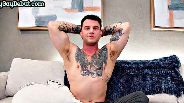 Inked jock masturbates solo on first casting