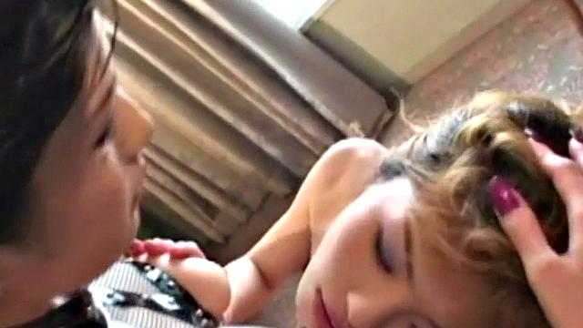 Lesbians strapon in raunchy embrace