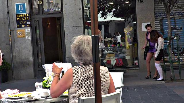 Busty slut submits publicly in front of crowding voyeurs