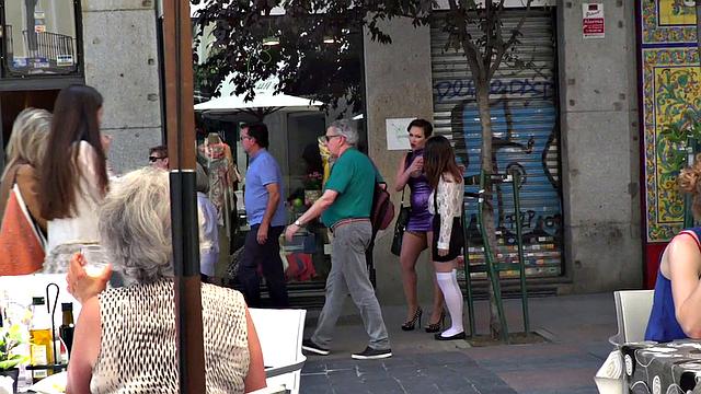 Busty slut submits publicly in front of crowding voyeurs