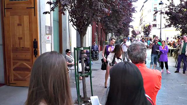 Busty slut submits publicly in front of crowding voyeurs