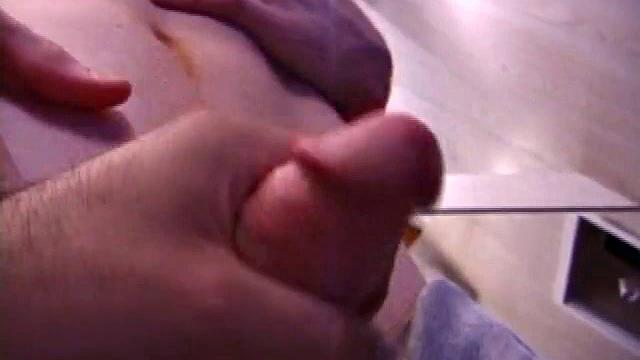 Tristian grabs his balls and strokes his long cock with determination. He kneels down before us and sticks his dick right in front of the camera. Standing back up, Tristian continues to jack off, until he asks if we want it on our face.