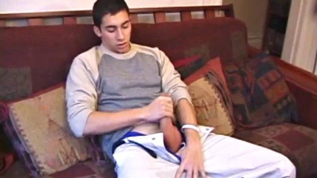 Levi starts watching a porn video and soon pulls out a monster dick. A good stroking on his rock hard bone produces a creamy cum load in his hands.