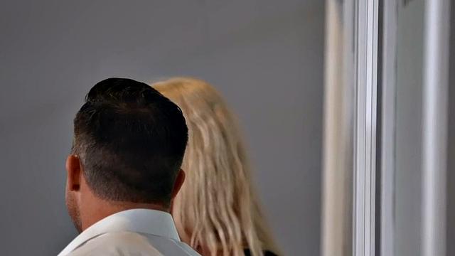 Bisexual busty MILF in threesome at car dealership