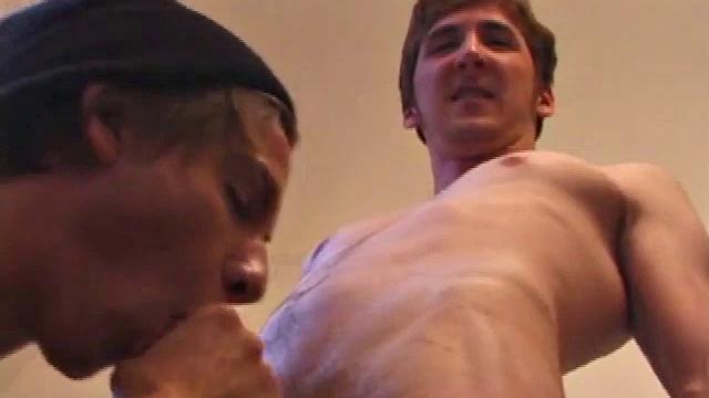 Brock is about to jack off while watching porn when Michael walks in. Unable to skateboard in the rain, he joins Brock on the sofa. Both are straight but have no problem stroking one out next to each other.