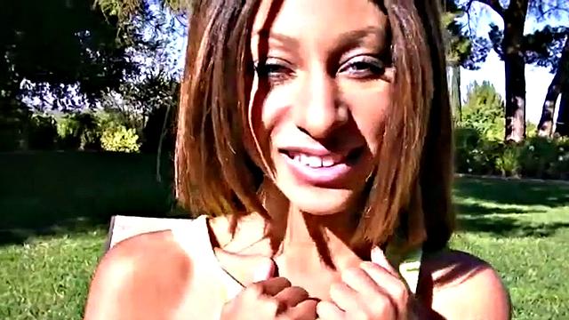 Teen masturbates outdoors in close-up scene