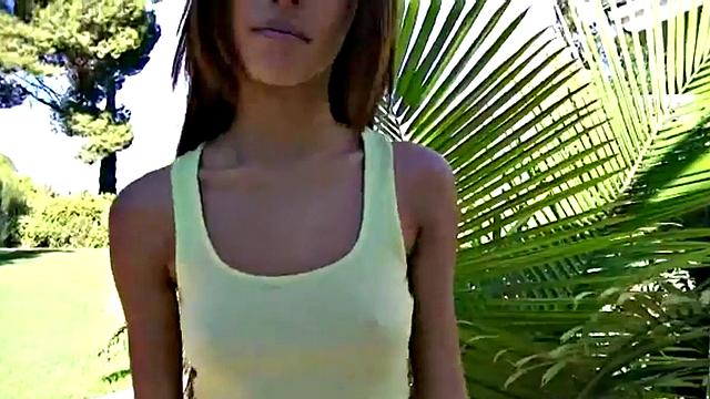 Teen masturbates outdoors in close-up scene