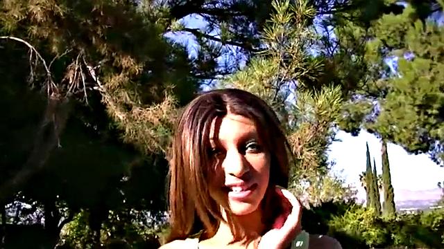 Teen masturbates outdoors in close-up scene