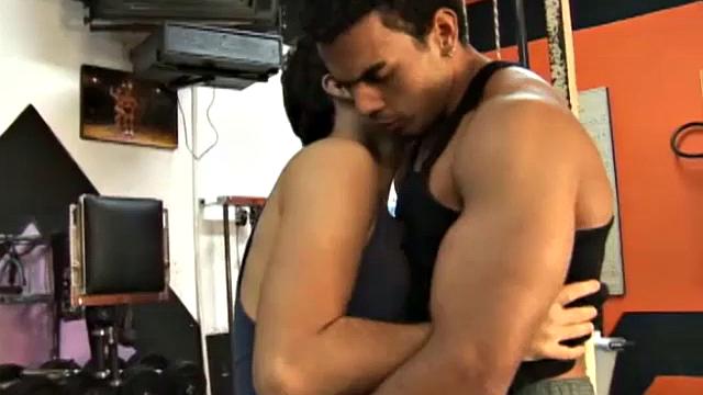 Ciao, the muscle bound Latino gym instructor, gives cute Poax an extra lesson in gay bareback sex