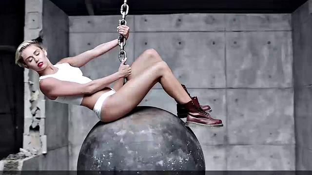 Miley Cyrus completely naked on the ball