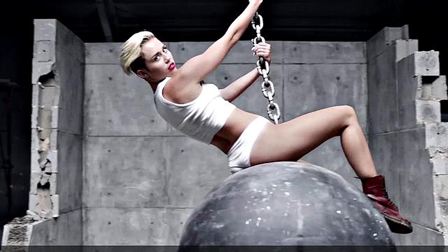 Miley Cyrus completely naked on the ball