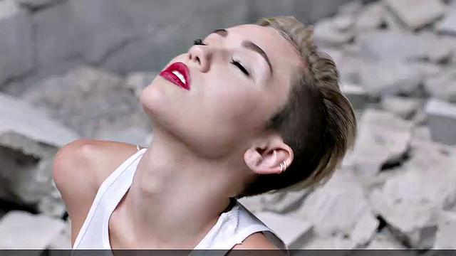 Miley Cyrus completely naked on the ball