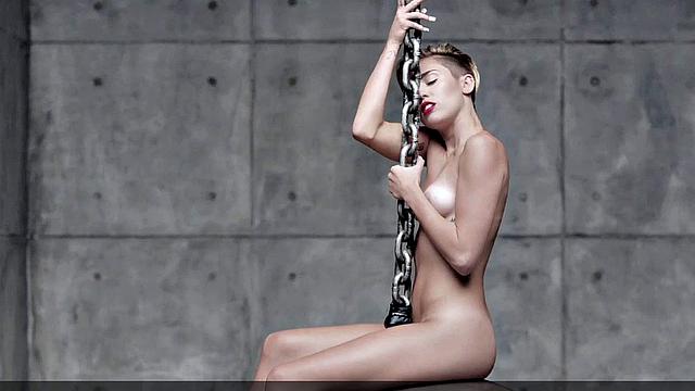 Miley Cyrus completely naked on the ball