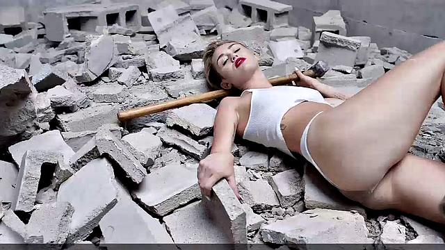 Miley Cyrus completely naked on the ball