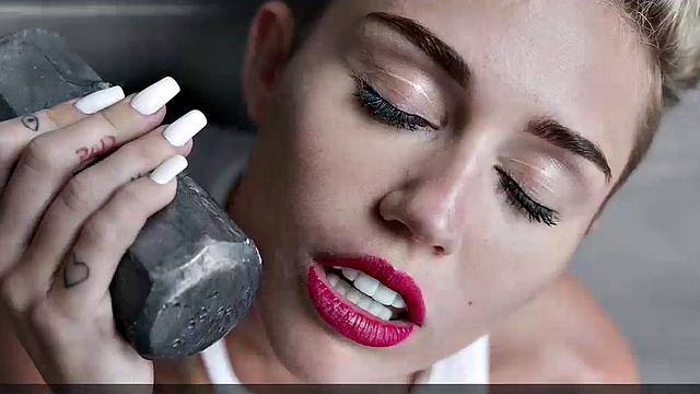 Miley Cyrus completely naked on the ball