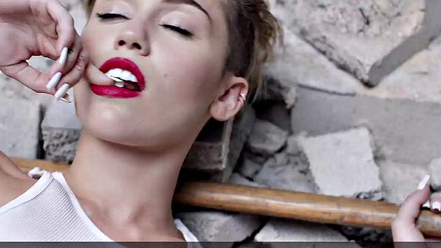 Miley Cyrus completely naked on the ball