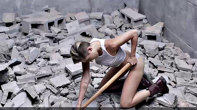 Miley Cyrus completely naked on the ball