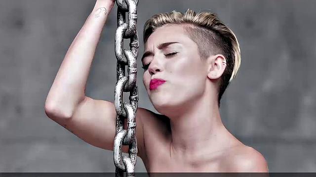 Miley Cyrus completely naked on the ball