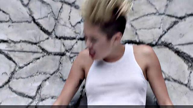 Miley Cyrus completely naked on the ball