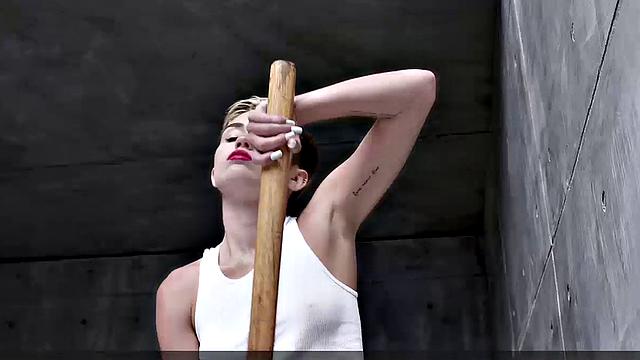 Miley Cyrus completely naked on the ball