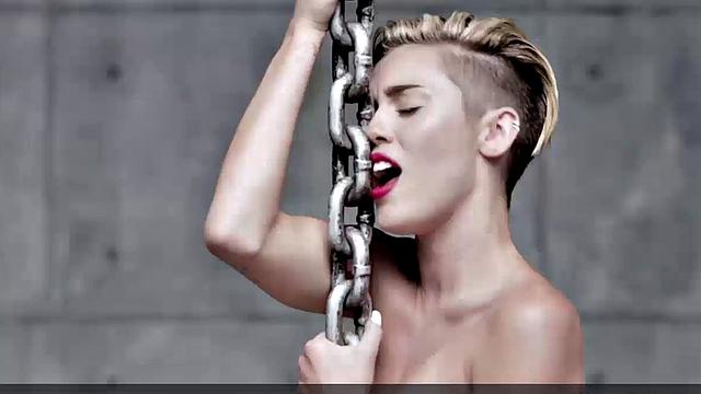 Miley Cyrus completely naked on the ball