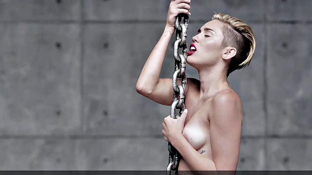 Miley Cyrus completely naked on the ball