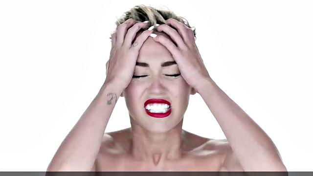 Miley Cyrus completely naked on the ball