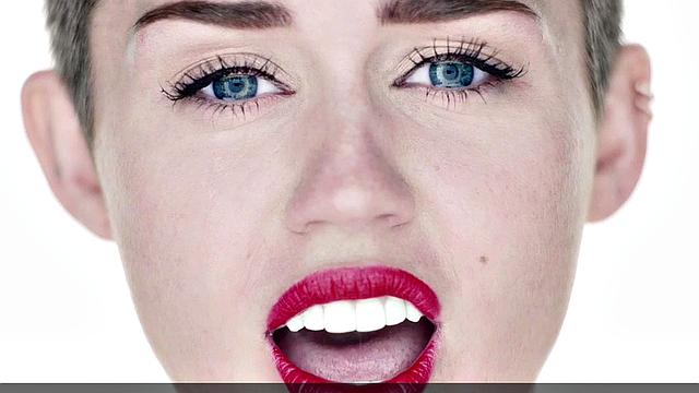 Miley Cyrus completely naked on the ball