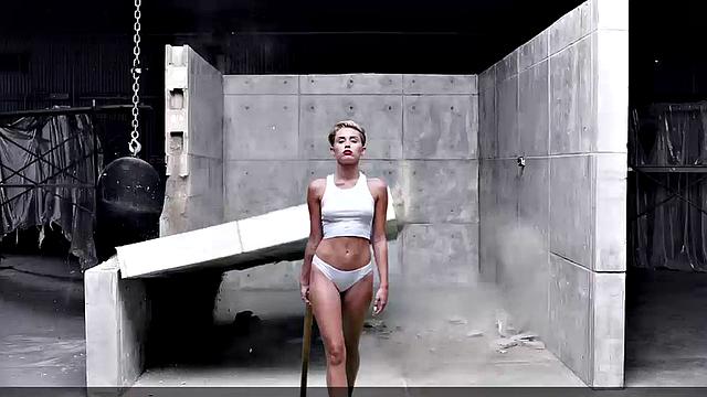 Miley Cyrus completely naked on the ball