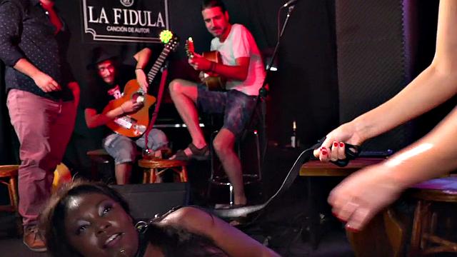 Public Ebony dyke punished by lezdom in front of voyeurs