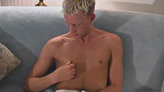 Blond 21 year old Shane Scott is out cruising around in a speedboat when he starts to get horny. He pulls into a secluded cove and strokes his huge cock.