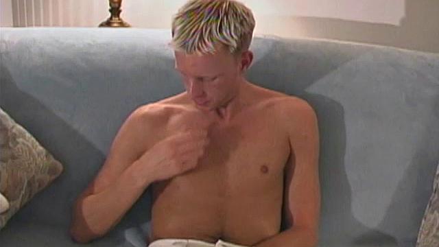 Blond 21 year old Shane Scott is out cruising around in a speedboat when he starts to get horny. He pulls into a secluded cove and strokes his huge cock.