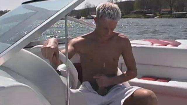 Blond 21 year old Shane Scott is out cruising around in a speedboat when he starts to get horny. He pulls into a secluded cove and strokes his huge cock.