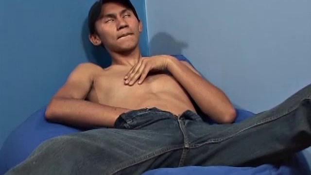Eduardo is a cute 19 year old Latino studying auto mechanic. After fixing a car issue, he jerks off. Eduardo plants his skinny ass in a bean bag chair and strips off.