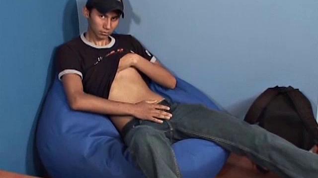 Eduardo is a cute 19 year old Latino studying auto mechanic. After fixing a car issue, he jerks off. Eduardo plants his skinny ass in a bean bag chair and strips off.