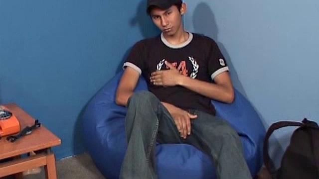 Eduardo is a cute 19 year old Latino studying auto mechanic. After fixing a car issue, he jerks off. Eduardo plants his skinny ass in a bean bag chair and strips off.