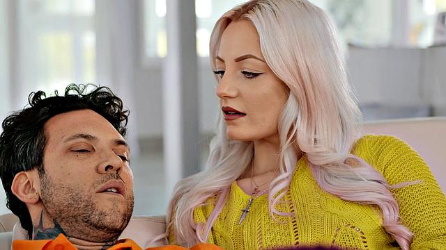 A tattooed brown-haired babe give a sloppy blowjob while wearing shorts and glasses