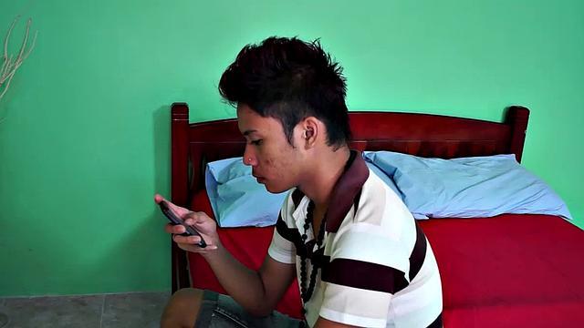 Cute Asian Idol is feeling quite idle and bored. So he picks up his phone and texts his cute Asian fuck buddy to see if he wants to come over and play. When he arrives, the bareback fucking begins.