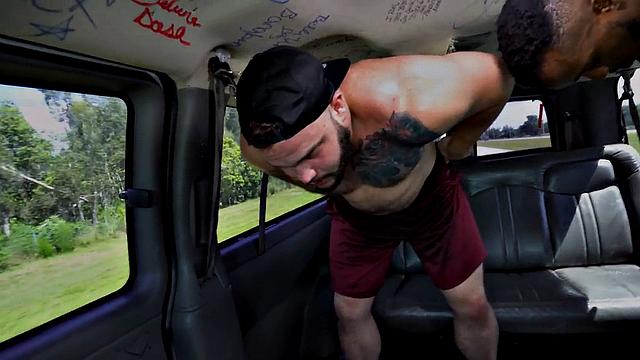 Muscled jock fucks black ass in public outdoor van