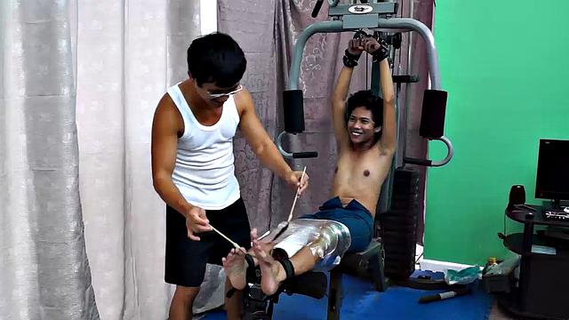 These ticklish boys just keep coming for a workout, and they surely get one! This time Asian cutie Idol gets restrained to the gym equipment for a wholesome tickle workout on every muscle of his twink body.