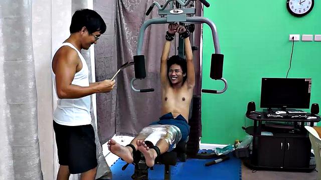 These ticklish boys just keep coming for a workout, and they surely get one! This time Asian cutie Idol gets restrained to the gym equipment for a wholesome tickle workout on every muscle of his twink body.