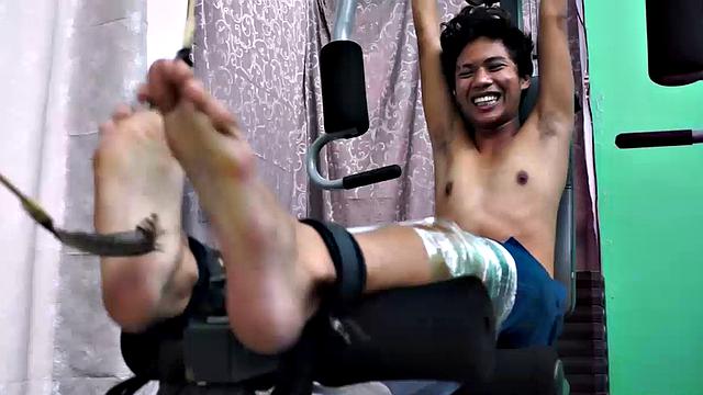 These ticklish boys just keep coming for a workout, and they surely get one! This time Asian cutie Idol gets restrained to the gym equipment for a wholesome tickle workout on every muscle of his twink body.