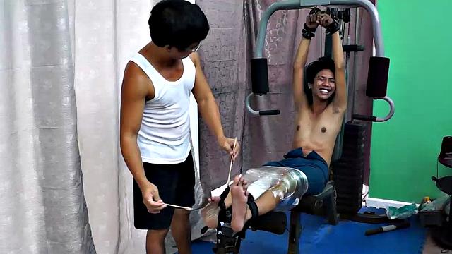 These ticklish boys just keep coming for a workout, and they surely get one! This time Asian cutie Idol gets restrained to the gym equipment for a wholesome tickle workout on every muscle of his twink body.