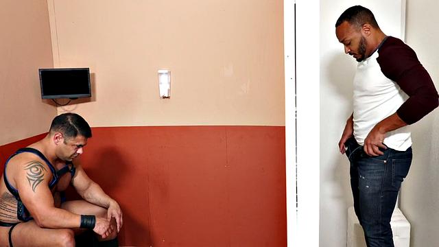 Muscular black guy gets his ass drilled raw by beefy robot gloryhole