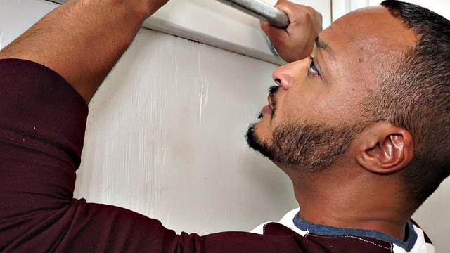 Muscular black guy gets his ass drilled raw by beefy robot gloryhole