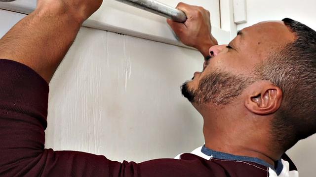 Muscular black guy gets his ass drilled raw by beefy robot gloryhole